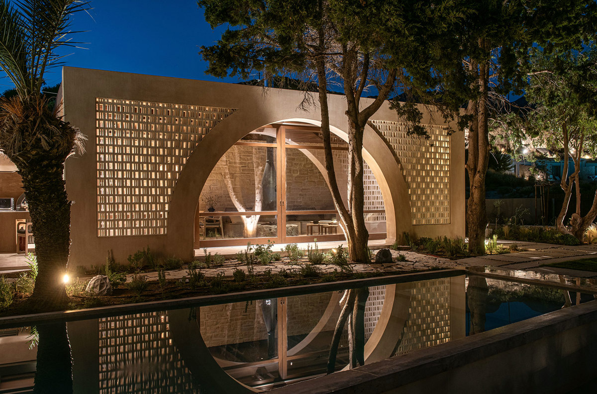 Curved modern architecture at night
